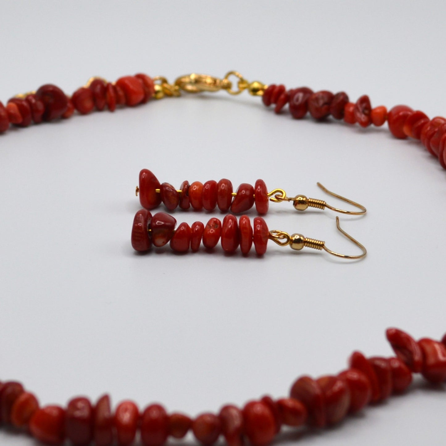 Red Bamboo Coral Beads with a 18kt Gold Clasp and 18kt Gold Earring Hooks