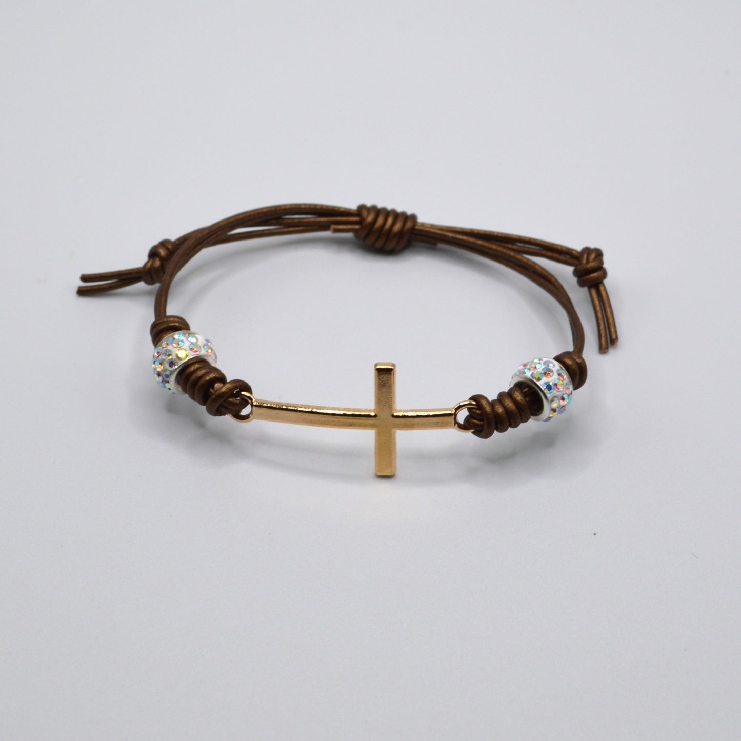 Gold Cross and Rhinestone Beads on a Leather Cord Bracelet