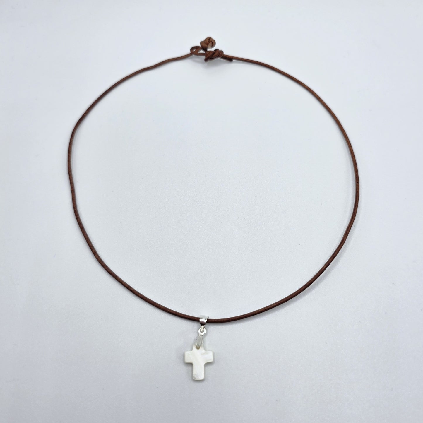 Mother of Pearl Cross with Silver on a Leather Cord
