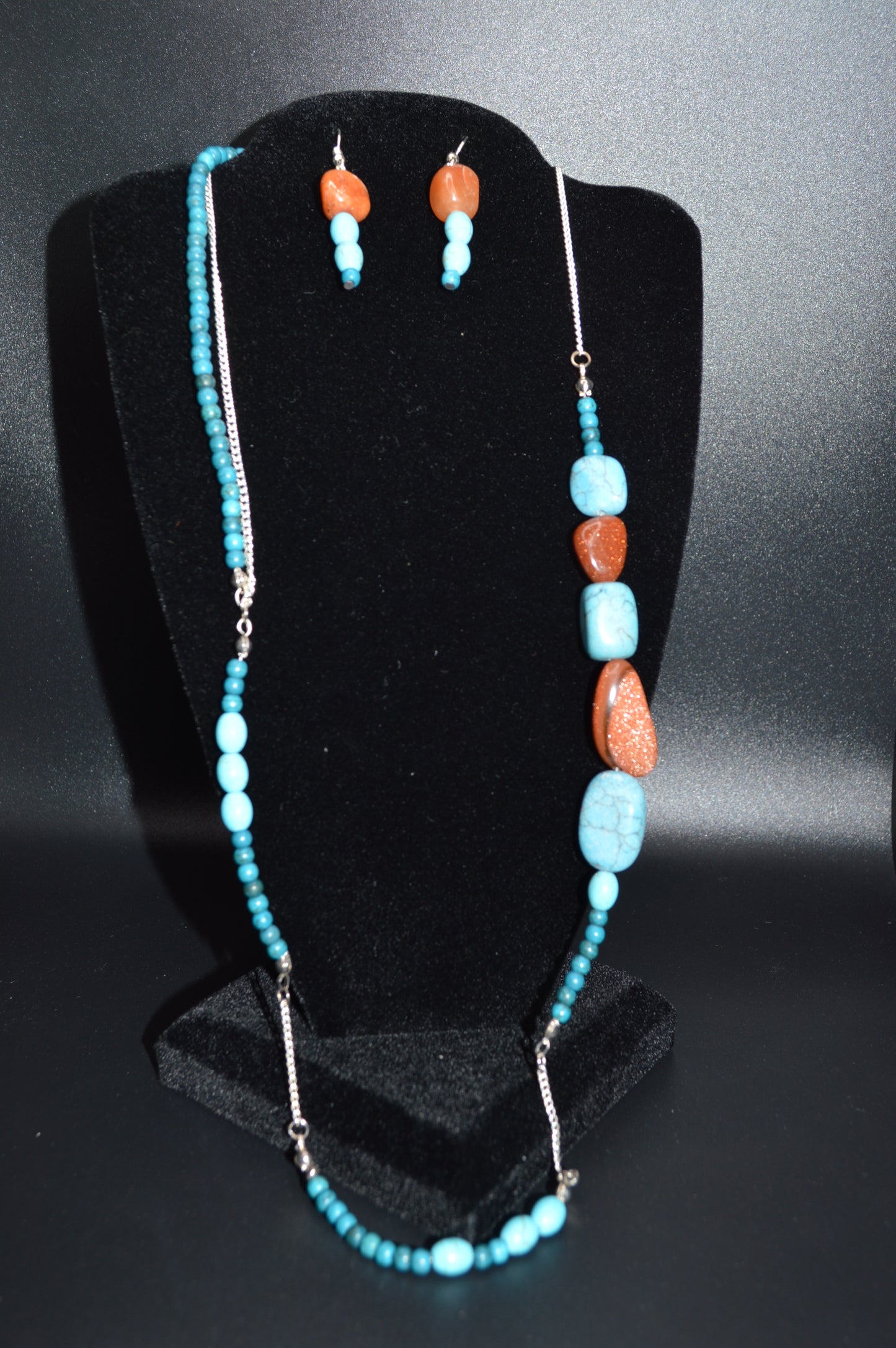 Brown and Turquoise Colored Stones on a Silver Chain Necklace and Earring Set