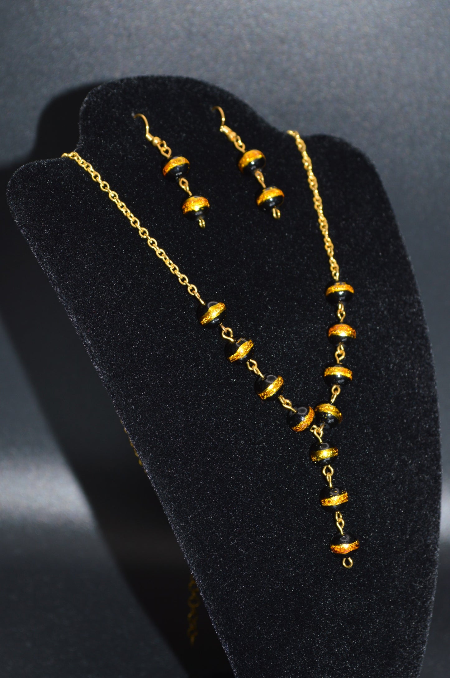 Black with a Gold Stripe Earrings (Double Bead)