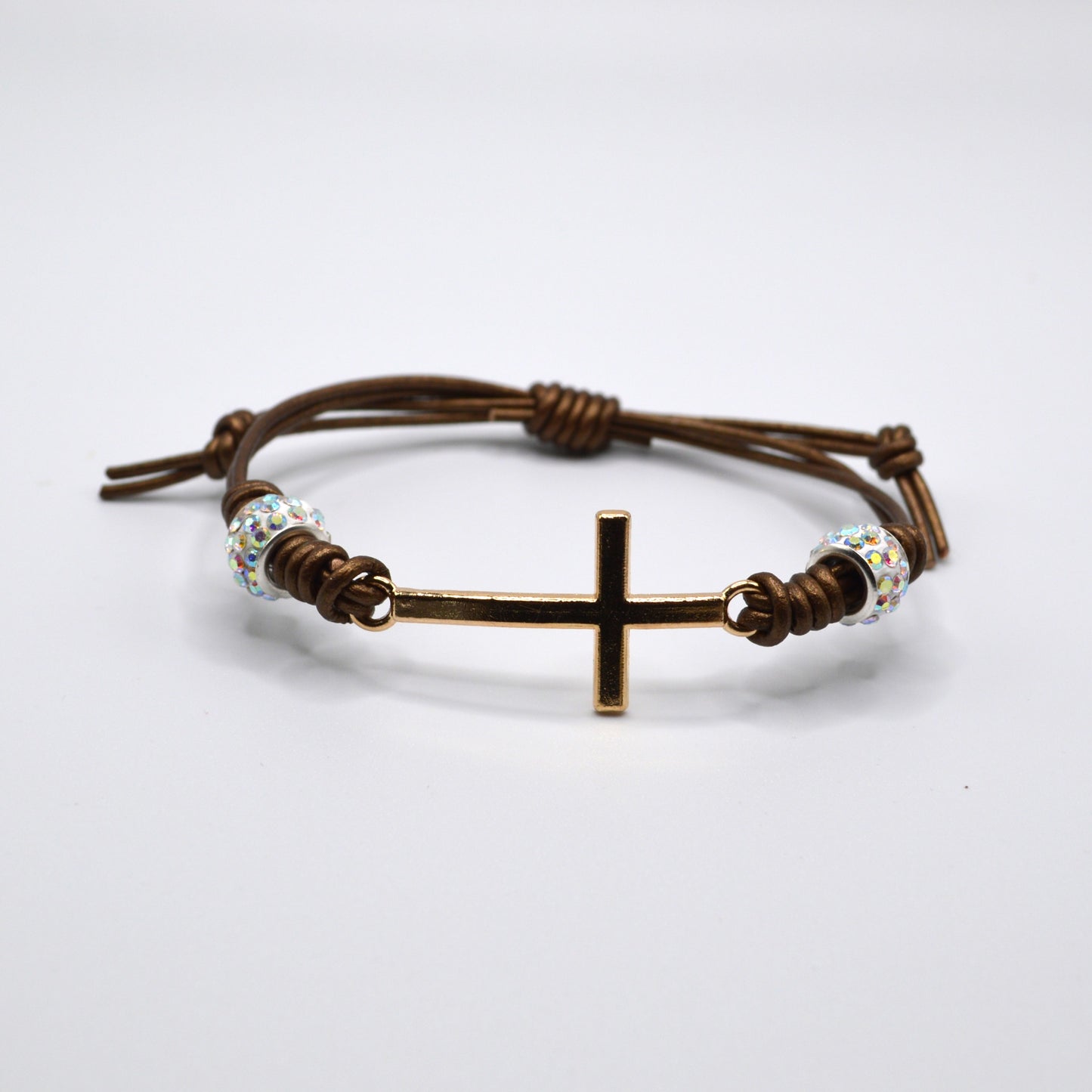 Gold Cross and Rhinestone Beads on a Leather Cord Bracelet