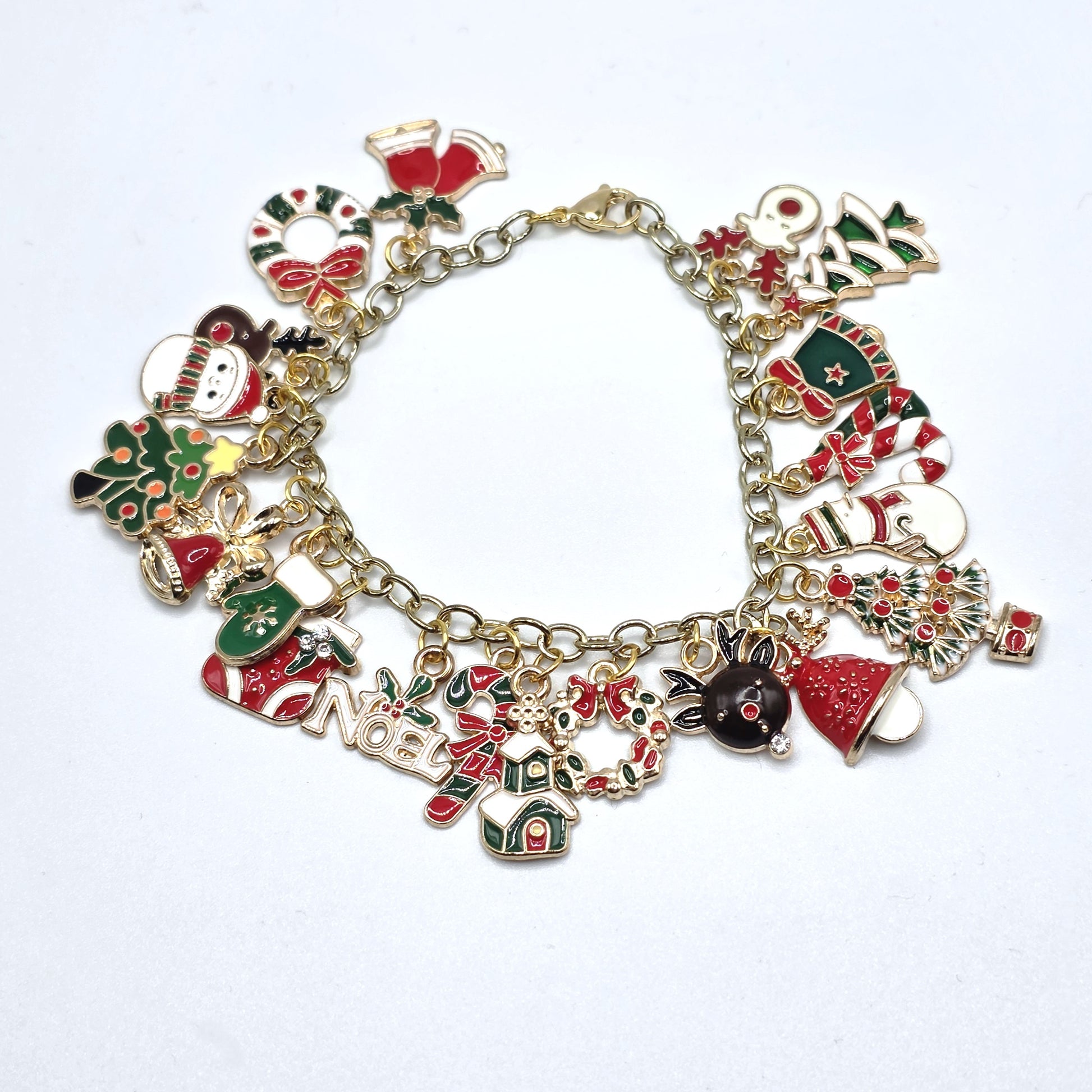 Christmas-themed charm bracelet on a white background