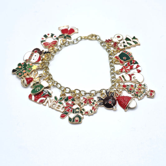 Christmas-themed charm bracelet on a white background