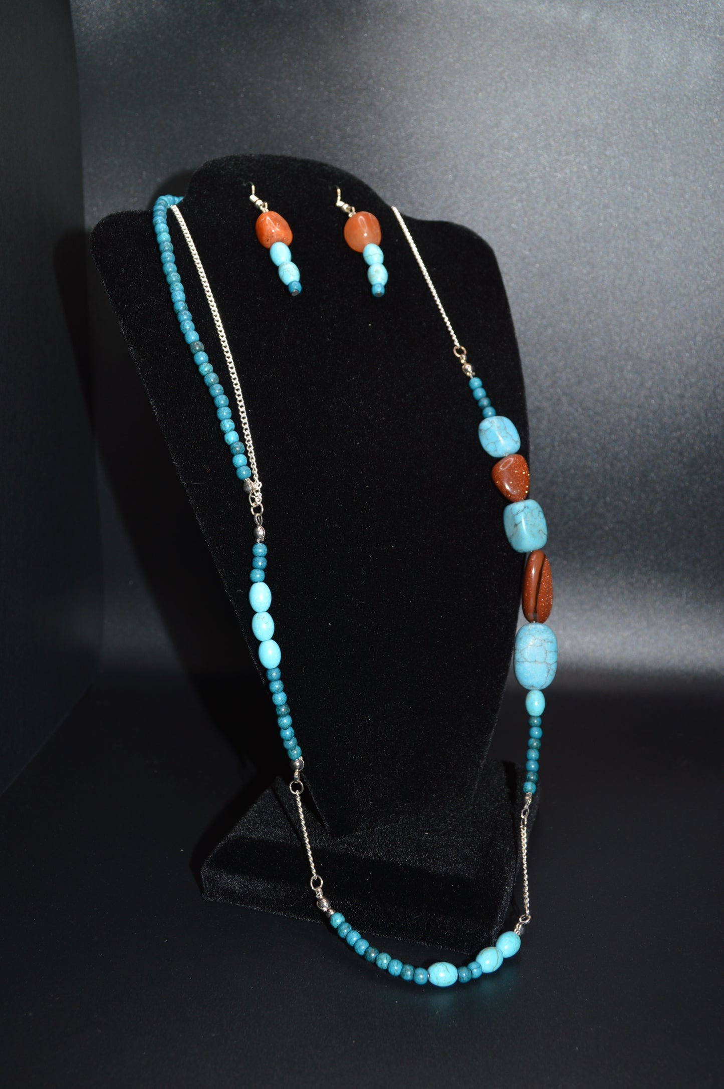Brown and Turquoise Colored Stones on a Silver Chain Necklace and Earring Set