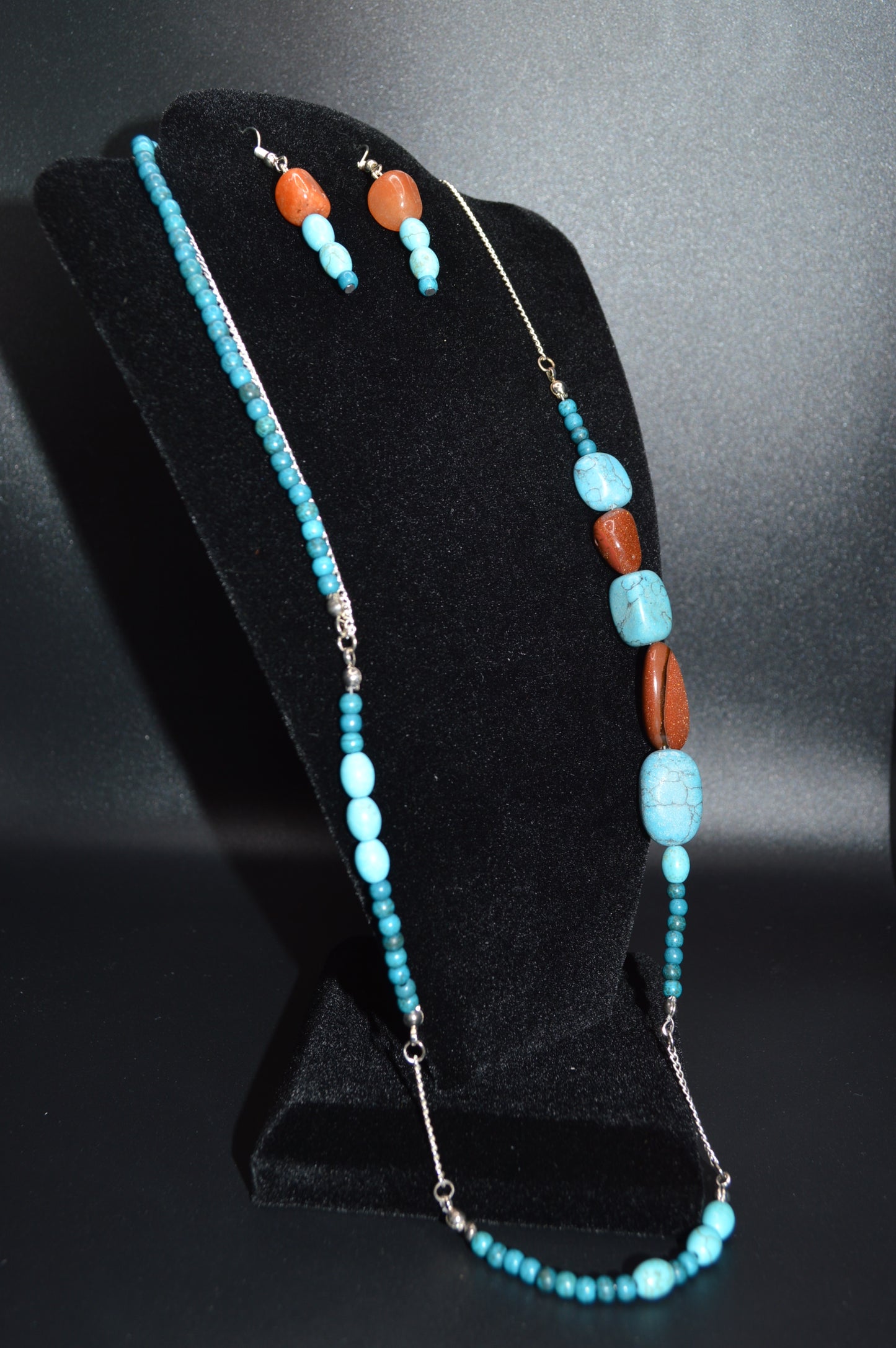 Brown and Turquoise Colored Stones on a Silver Chain Necklace and Earring Set