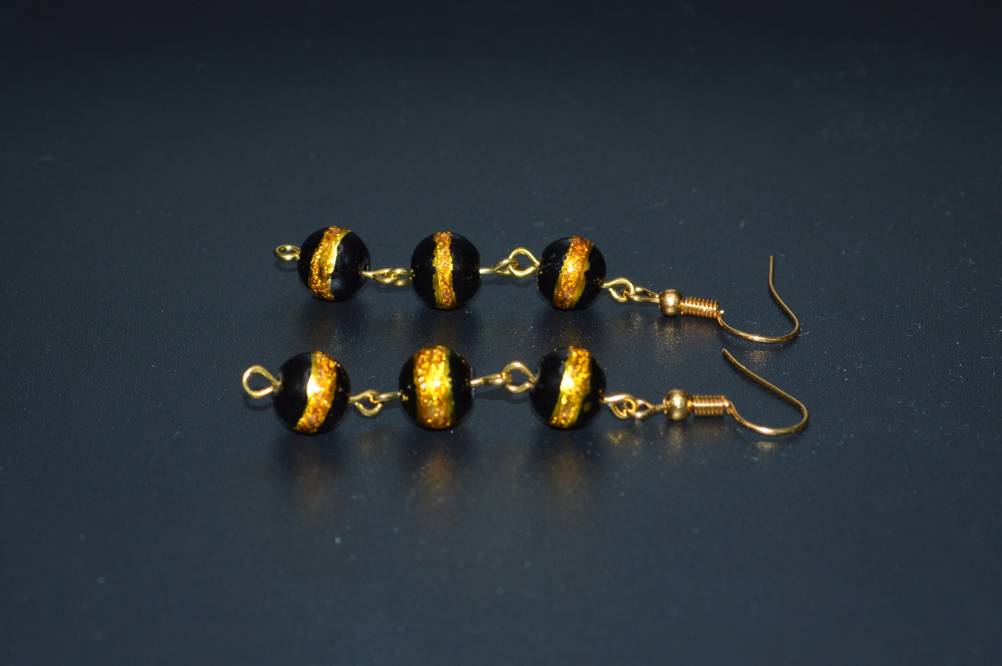Black with a Gold Stripe Earrings (Triple Bead)
